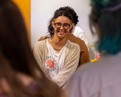 Kyoti Tavarez '24 laughs at the opening of Susquehanna's LGBTQ+ Resource Center.
